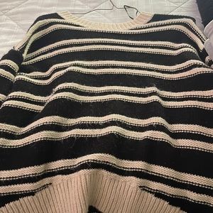 Black and cream sweater